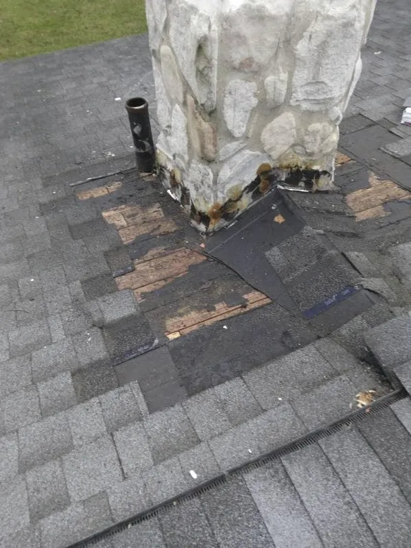 Roof flashing damage detail before repair